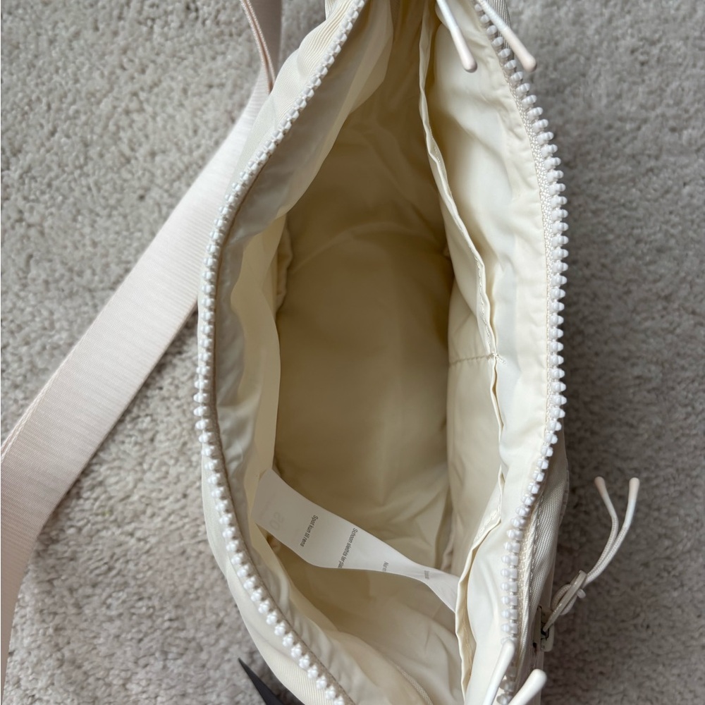 Fabletics “The Sling Bag” in Bone Crossbody Bag - Picture 9 of 10